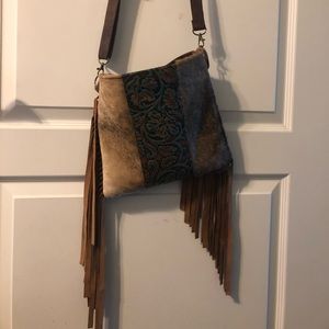 Cowhide and leather purse